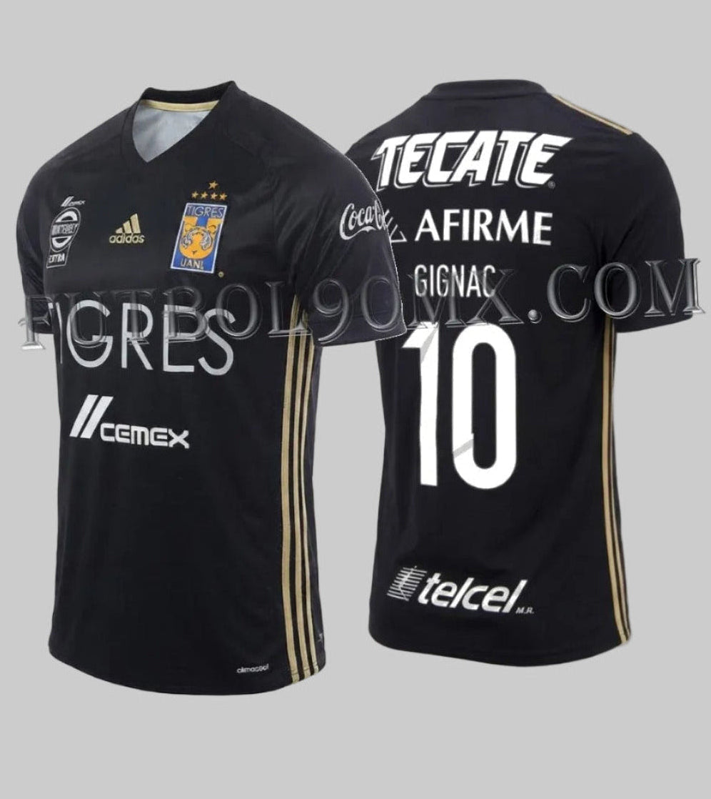 Vista frontal y posterior del jersey third Adidas Tigres UANL 2017 de André-Pierre Gignac (código B49159) en color negro con detalles dorados y patrocinadores oficiales, disponible en Futbol90MX