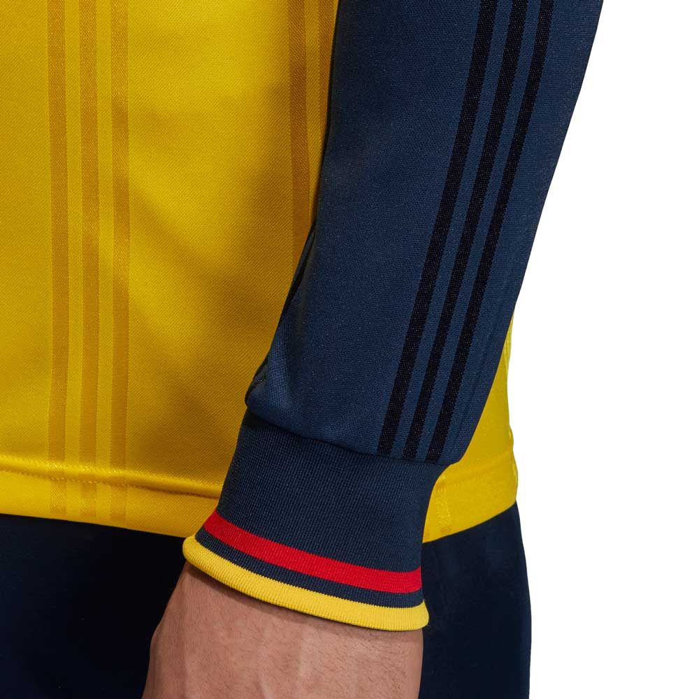 Detalle de los puños en el jersey manga larga Adidas Arsenal FC Icons 2019/20, exhibiendo acabado premium y estado de archivo.