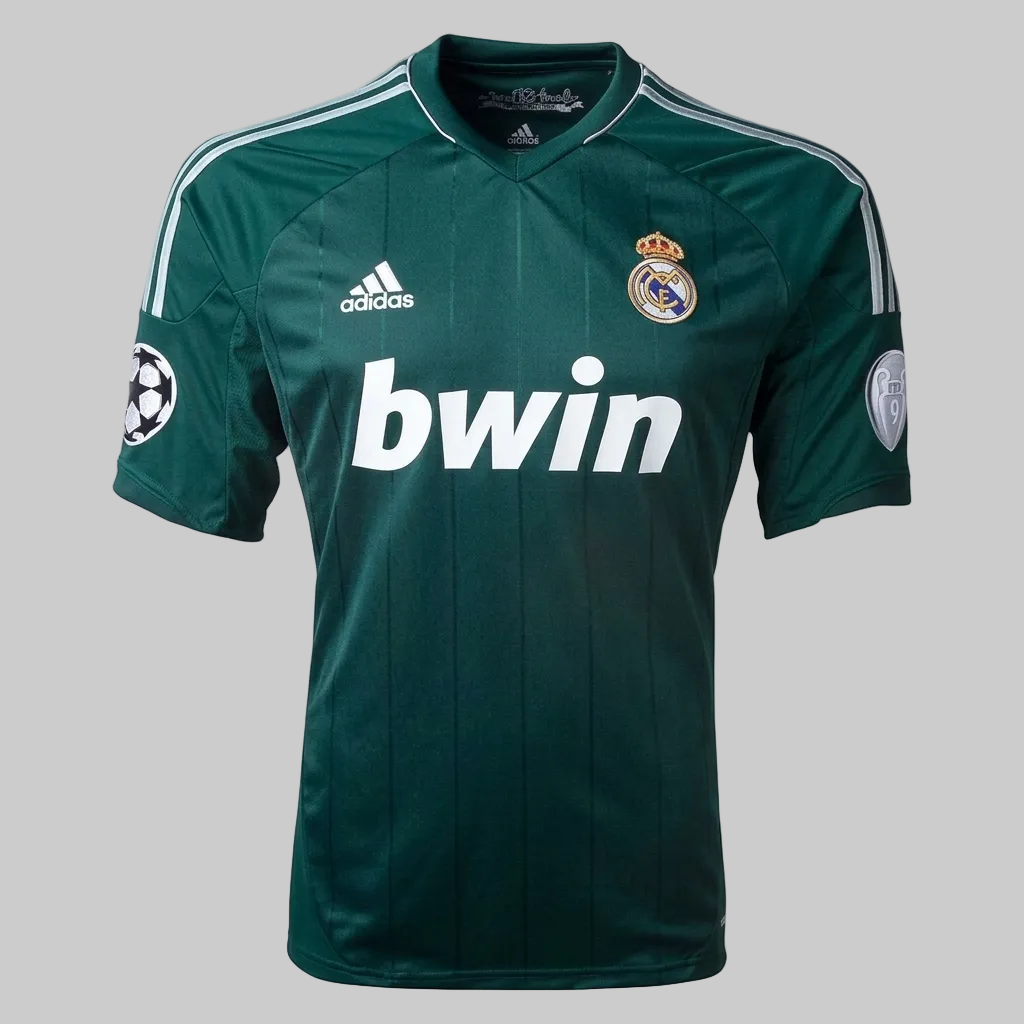 Jersey oficial Adidas Real Madrid 2012-13 tercera equipación color verde profundo configuración UEFA Champions League.