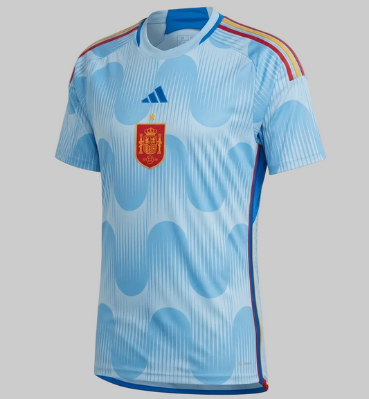 Jersey de visita Adidas España Copa Mundial FIFA 2022, vista frontal completa, color azul glaciar, código HE2020, disponible en Futbol90MX