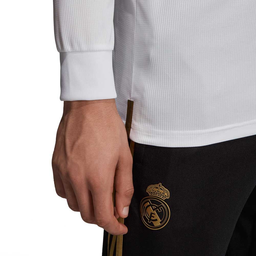 Primer plano del puño de manga larga y detalles del jersey Adidas Real Madrid manga larga local UCL 2019/20 de Sergio Ramos (DZ0439) en la Historical Archive Boutique de Futbol90MX, resaltando la calidad textil.