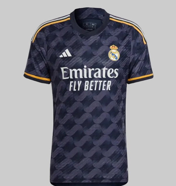 Vista frontal completa del jersey Adidas Vini Jr Real Madrid Authentic Match visitante UEFA Champions League 2023/24 (Ref. IA5138) con patrón gráfico de color azul noche en Futbol90MX