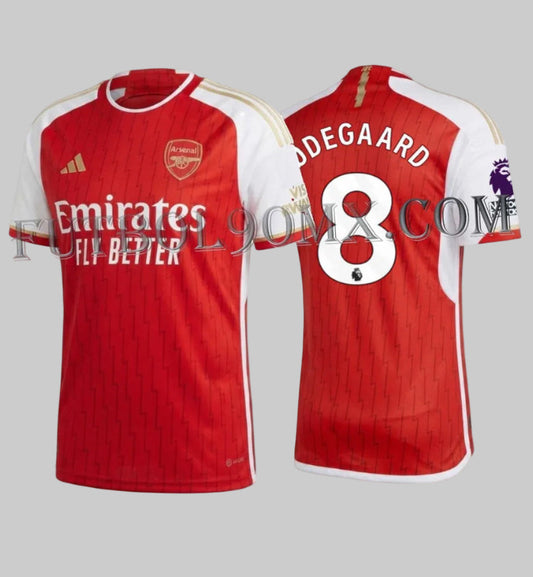 Vista frontal del Jersey Adidas Authentic Match de Local del Arsenal FC 2023-24, incluye la personalización oficial de la Premier League con el nombre 'ODEGAARD' y el dorsal '8' en blanco con borde negro, sobre la textura técnica roja, codigo HR6931, disponible en Futbol90MX