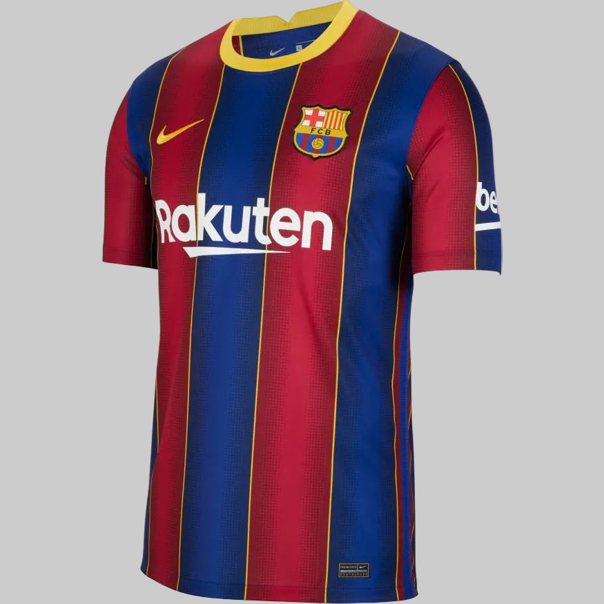 Vista tres cuartos del jersey Nike Ansu Fati FC Barcelona local 2020/21 (Ref. CD4232-456) con franjas blaugranas y líneas doradas, stock Futbol90MX