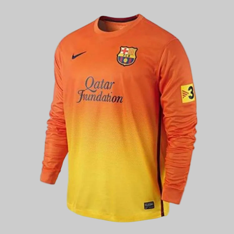 Jersey de visita manga larga FC Barcelona 2012/13 en degradado naranja y amarillo, versión oficial con patrocinio Qatar Foundation.