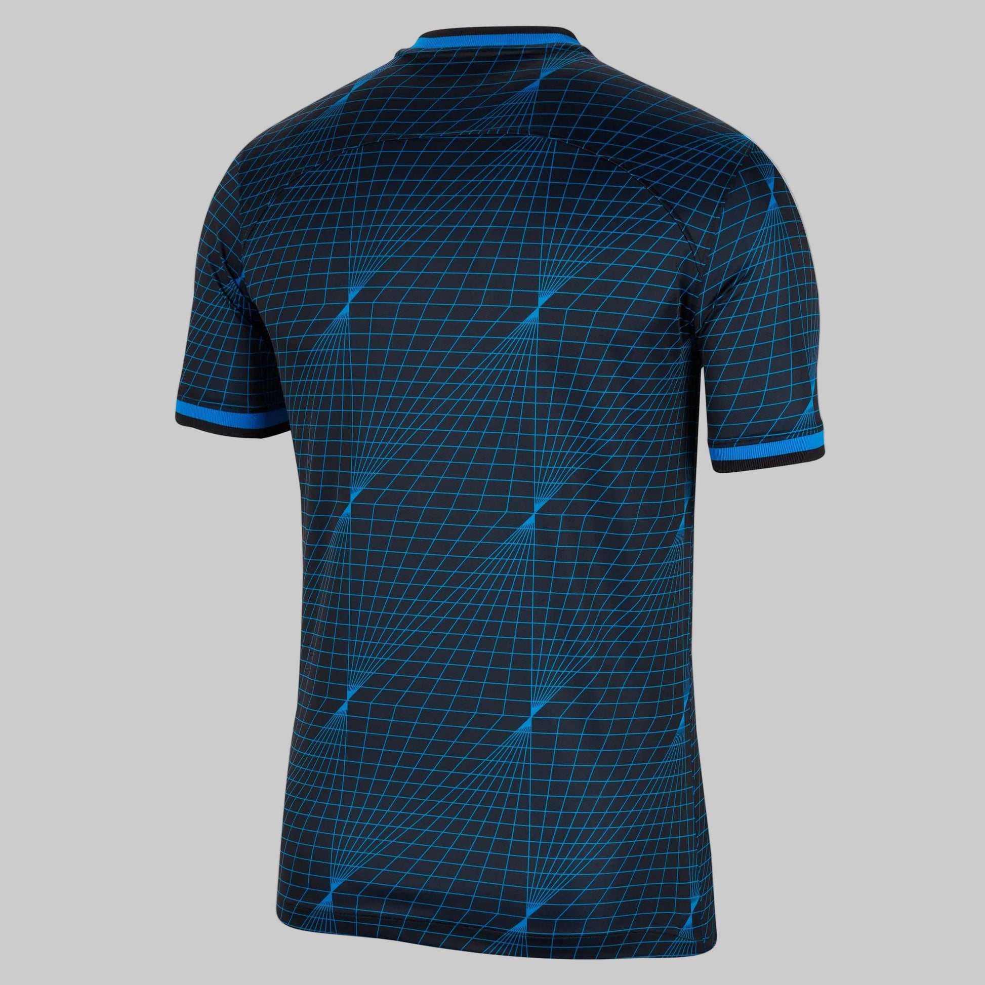 Vista posterior del jersey de visita del Chelsea FC destacando la continuidad del patrón gráfico y el cuello redondo en contraste azul, disponible en Futbol90MX, Historical Archive Boutique