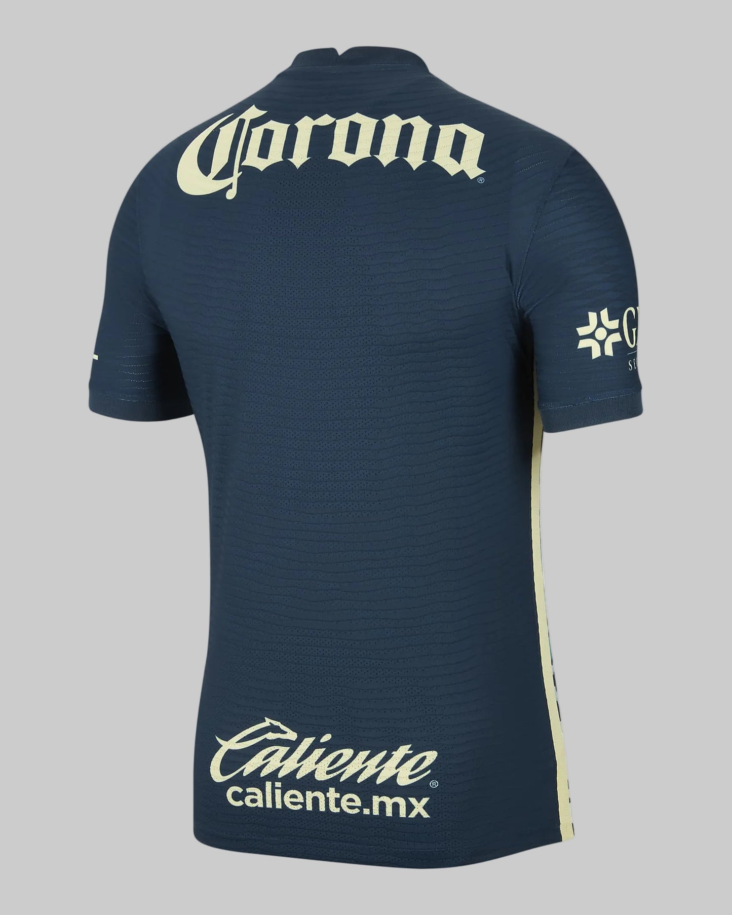 Vista posterior del Jersey de visitante Nike Club América 2021/22 versión ADV Vapor Match con patrón azteca y escudos termosellados.