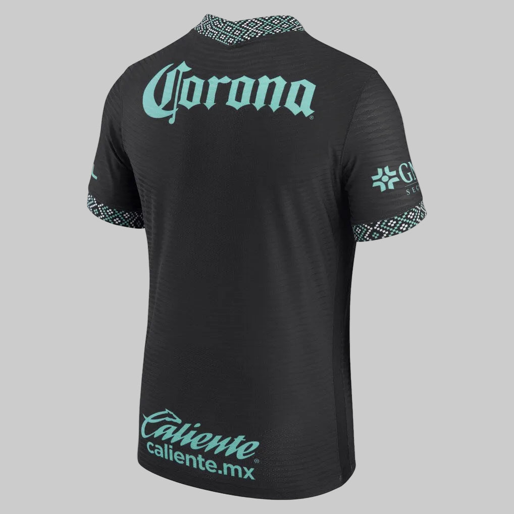 Vista posterior de Jersey de jugador Nike Club América Tercero 2021/22 en color carbón con logotipos en verde jade y tejido de tecnología avanzada Dri-FIT ADV.