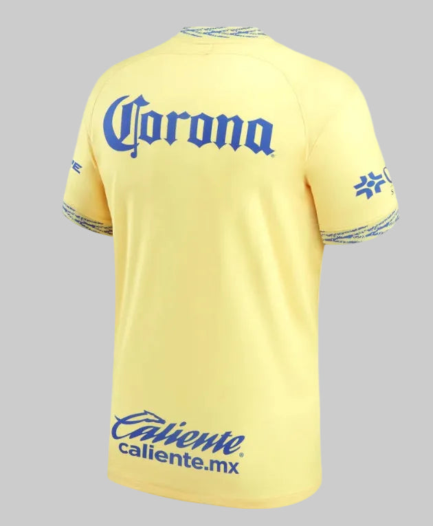 Parte trasera del jersey en amarillo sólido, lista para personalización con tipografía oficial de la temporada 22/23.