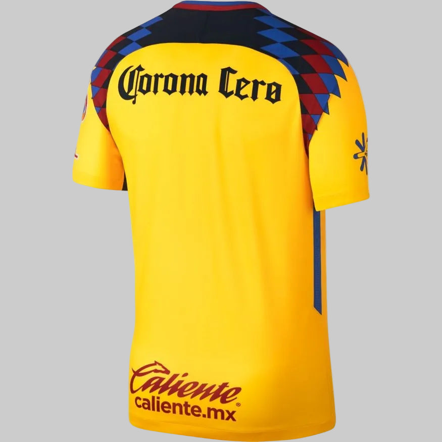 Vista posterior completa del tercer jersey Nike del Club América 2018 (código 847304-720), mostrando el diseño limpio en tono amarillo vibrante y el corte clásico de la prenda de archivo, en Futbol90MX