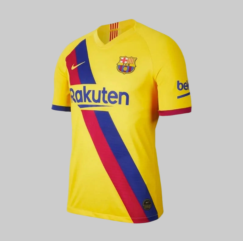Jersey Nike FC Barcelona 2019-20 authentic vapor match de visita de Lionel Messi, diseño amarillo con banda diagonal azulgrana en versión Vapor Match.