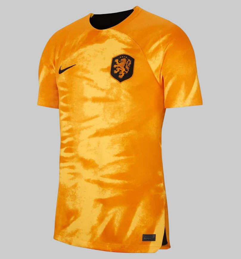 Jersey Nike DN0694-845 Países Bajos Local 2022, diseño oficial Copa Mundial FIFA con patrón Lion's Mane en color Laser Orange en Futbol90MX