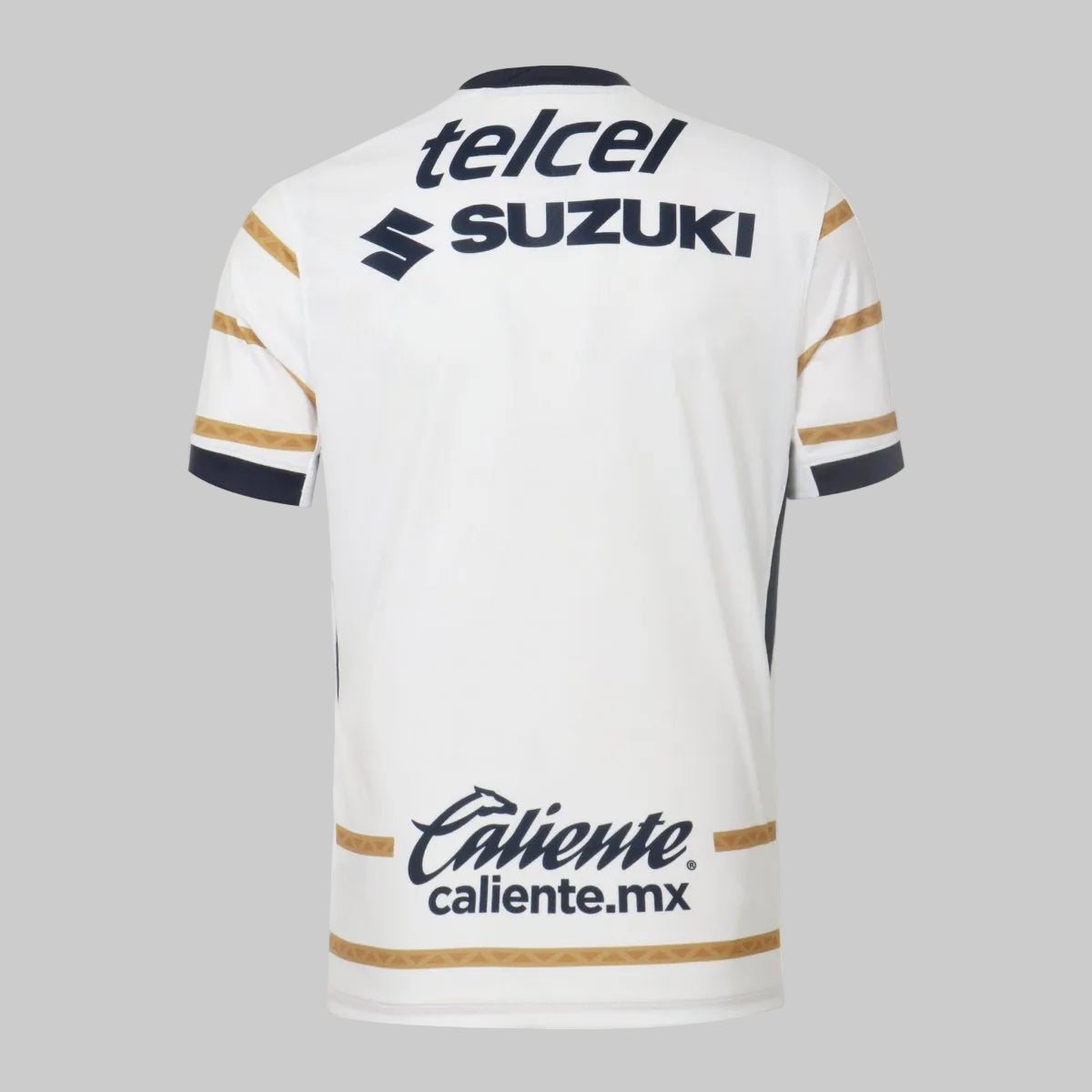 Parte posterior del jersey Nike Pumas 2024/25 mostrando la continuidad de las franjas doradas y los patrocinadores Telcel y Suzuki en la parte superior, disponible en Futbol90MX