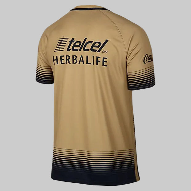 Vista posterior del Jersey Nike Pumas UNAM Visitante 2015/16 en color oro metálico