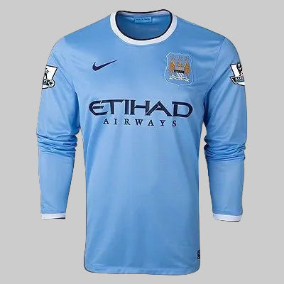 Jersey manga larga Nike Manchester City 2013-14 local color sky blue con puños elásticos en contraste.