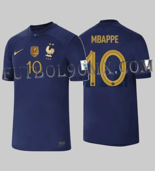 Jersey Nike Stadium de Francia, edición de local manga corta Copa Mundial Qatar 2022, personalizado con el nombre y dorsal #10 de Kylian Mbappé, codigo DN0690-410 en Futbol90MX