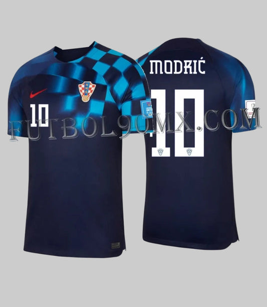 Jersey de visita de la Selección de Croacia, Copa Mundial FIFA 2022, edición oficial Luka Modrić #10. Diseño Nike DN0683-498 con patrón de ajedrez en tonos azul profundo. Producto Deadstock en Futbol90MX