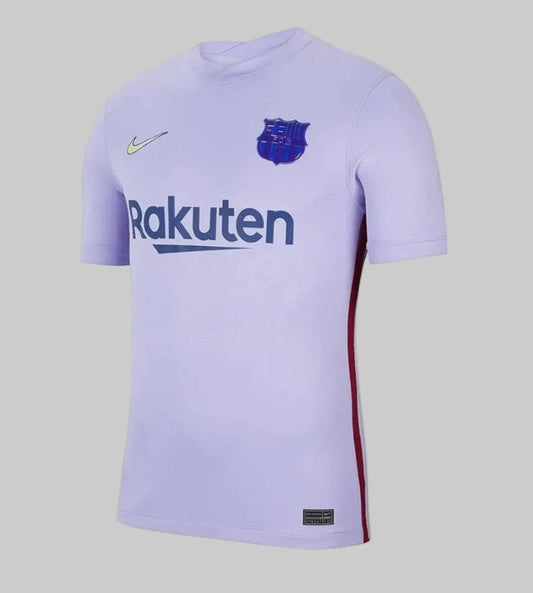 Nike FC Barcelona Jersey de Visita 2021/22 (CV7890-581) en Futbol90MX. Vista frontal completa en color violeta claro con logotipo iridiscente de Nike, patrocinio "Rakuten" y escudo tornasolado.