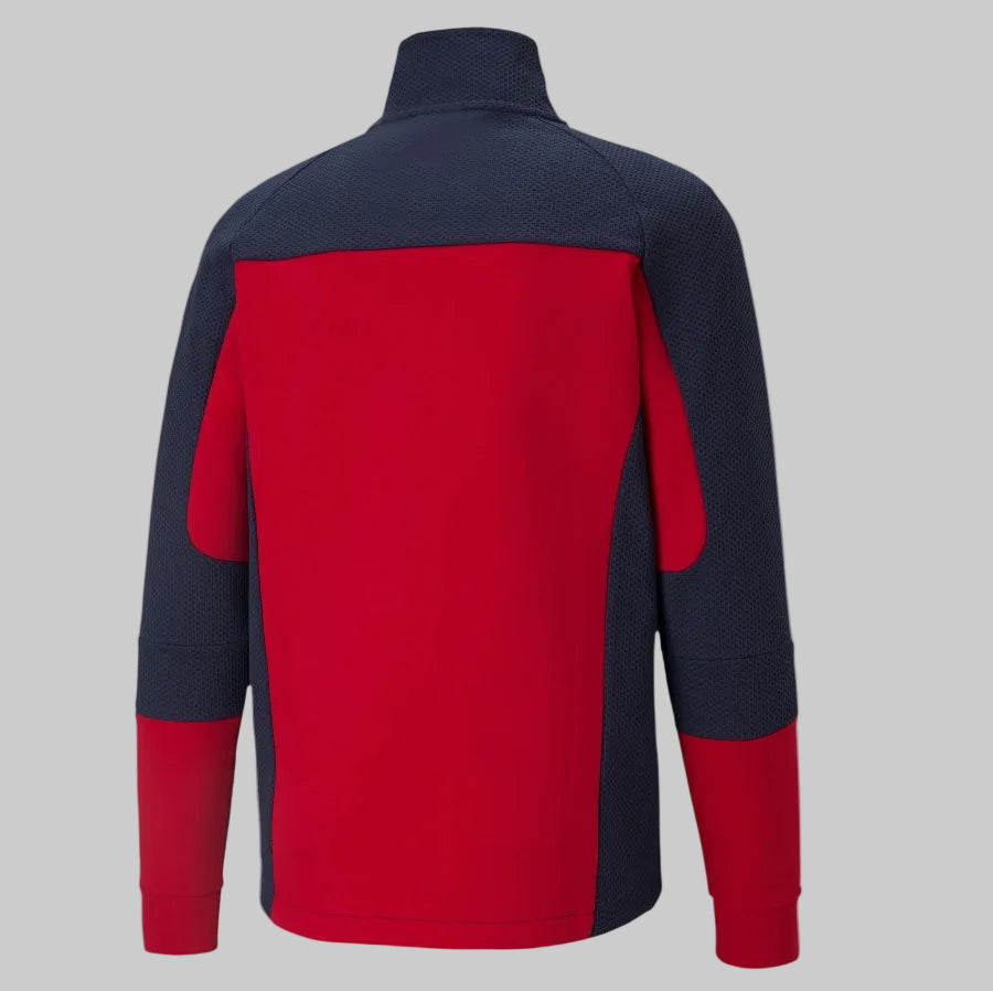 Vista posterior de la chamarra Puma Evostripe Chivas 2021, código 758759 01, mostrando el diseño ergonómico de la espalda en Futbol90MX