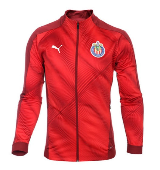 Escudo oficial del Club Deportivo Guadalajara y logotipo Puma Cat termo aplicado en chamarra prepartido original.