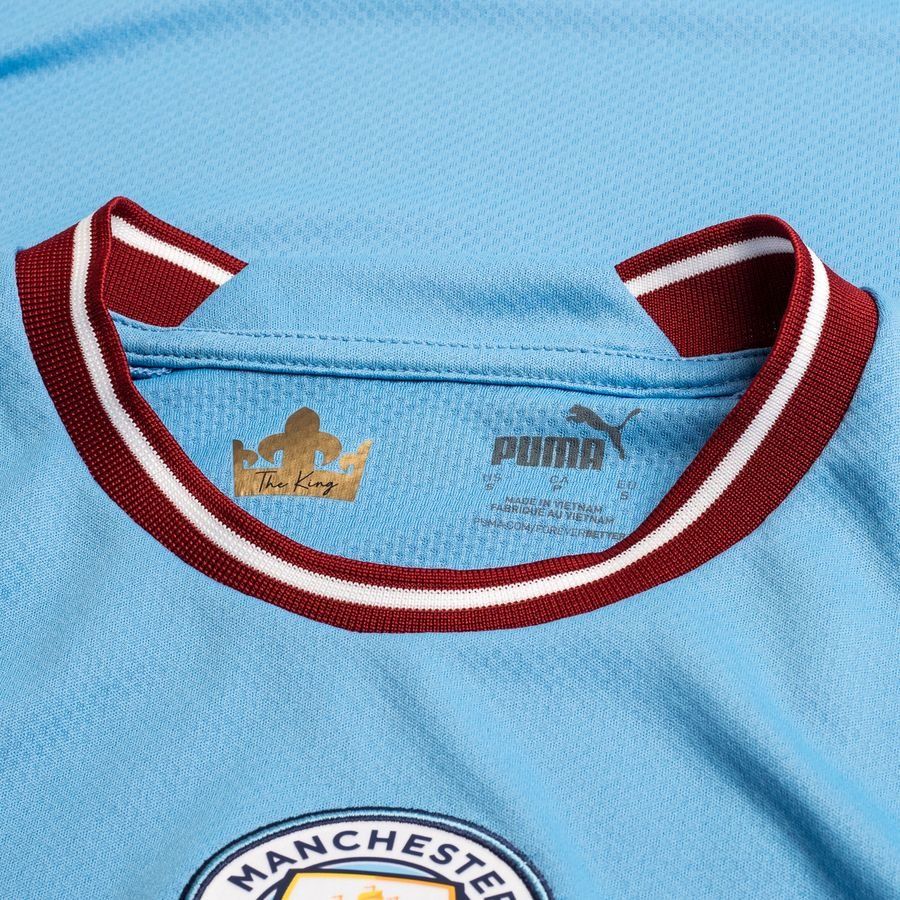 Cuello redondo y detalles impresos en jersey  de Haaland Manchester City 2022/23 edicion champions league