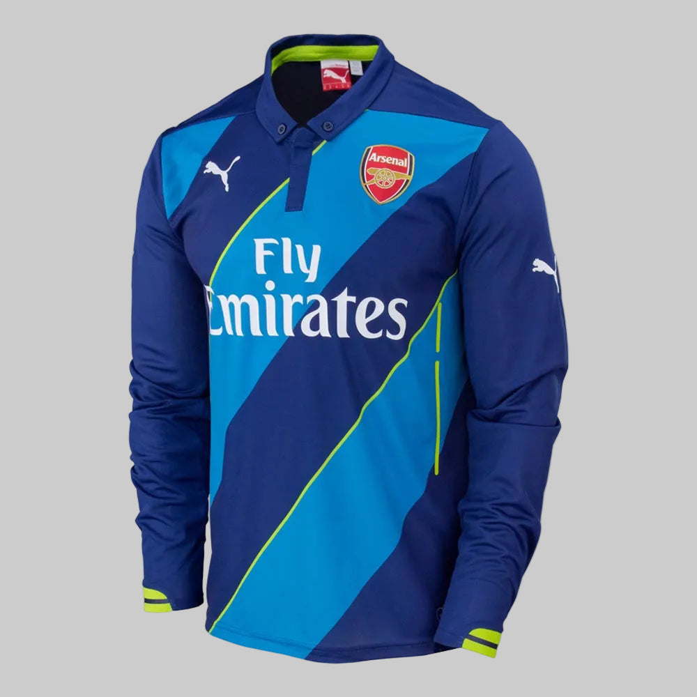 Jersey de archivo Arsenal FC 2014/15 Third, variante manga larga Puma, diseño de banda diagonal azul con detalles en verde lima, estado de colección 2026.